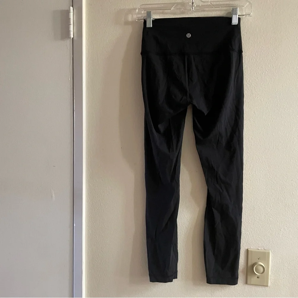 Lululemon black leggings size 4